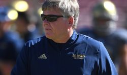 PALO ALTO, CA - SEPTEMBER 15: Head coach Dan Hawkins of the UC Davis Aggies looks on during pregame warm ups prior to his team playing the Stanford Cardinal at Stanford Stadium on September 15, 2018 in Palo Alto, California.