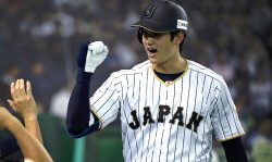 TOKYO, JAPAN - NOVEMBER 12: Shohei Ohtani #16 of Japan celebrates after hitting a solo homer in the fifth inning during the international friendly match between Japan and Netherlands at the Tokyo Dome on November 12, 2016 in Tokyo, Japan. (Photo by Masterpress/Getty Images)
