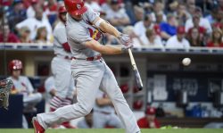 SAN DIEGO, CA - SEPTEMBER 7: Stephen Piscotty #55 of the St. Louis Cardinals hits a single during the second inning of a baseball game against the San Diego Padres at PETCO Park on September 7, 2017 in San Diego, California. (Photo by Denis Poroy/Getty Images)