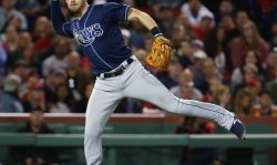 BOSTON, MA - SEPTEMBER 09: Evan Longoria #3 of the Tampa Bay Rays throws to first base in the third inning of a game against the Boston Red Sox at Fenway Park on September 9, 2017 in Boston, Massachusetts.