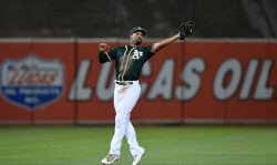 OAKLAND, CA - SEPTEMBER 22: Marcus Semien #10 of the Oakland Athletics catches a line drive off the bat of Adrian Beltre #29 of the Texas Rangers in the top of the eighth inning at Oakland Alameda Coliseum on September 22, 2017 in Oakland, California. (Photo by Thearon W. Henderson/Getty Images)