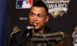 LOS ANGELES, CA - OCTOBER 25: 2017 Hank Aaron Award recipient Giancarlo Stanton #27 of the Miami Marlins attends the 2017 Hank Aaron Award press conference prior to game two of the 2017 World Series between the Houston Astros and the Los Angeles Dodgers at Dodger Stadium on October 25, 2017 in Los Angeles, California.