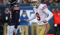 CHICAGO, IL - DECEMBER 03: Robbie Gould #9 of the San Francisco 49ers celebrates kicking the game winning field goal as Marcus Cooper #31 of the Chicago Bears leaves the field at Soldier Field on December 3, 2017 in Chicago, Illinois. The 49ers defetaed the Bears 15-14.