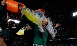 OAKLAND, CA - MAY 07: Mike Fiers #50 of the Oakland Athletics has Gatorade poured on him by teammates after pitching a no hitter against the Cincinnati Reds at the Oakland Coliseum on May 7, 2019 in Oakland, California. The Oakland Athletics defeated the Cincinnati Reds 2-0.