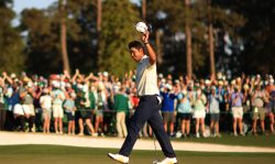 AUGUSTA, GEORGIA - APRIL 11: Hideki Matsuyama of Japan celebrates on the 18th green after winning the Masters at Augusta National Golf Club on April 11, 2021 in Augusta, Georgia. (Photo by Mike Ehrmann/Getty Images)