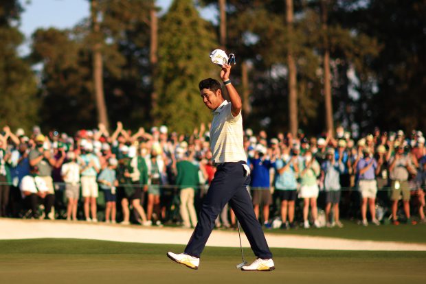 AUGUSTA, GEORGIA - APRIL 11: Hideki Matsuyama of Japan celebrates on the 18th green after winning the Masters at Augusta National Golf Club on April 11, 2021 in Augusta, Georgia. (Photo by Mike Ehrmann/Getty Images)
