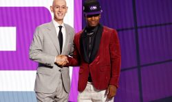 NEW YORK, NEW YORK - JULY 29: NBA commissioner Adam Silver (L) and Davion Mitchell pose for photos after Mitchell was drafted by the Sacramento Kings during the 2021 NBA Draft at the Barclays Center on July 29, 2021 in New York City. (Photo by Arturo Holmes/Getty Images)