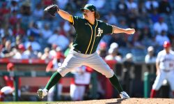 ANAHEIM, CA - AUGUST 01: Oakland Athletics pitcher Andrew Chafin (39) throws a pitch during a MLB game between the Oakland Athletics and the Los Angeles Angels of Anaheim on August 1, 2021 at Angel Stadium of Anaheim in Anaheim, CA. (Photo by Brian Rothmuller/Icon Sportswire via Getty Images)