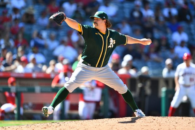 ANAHEIM, CA - AUGUST 01: Oakland Athletics pitcher Andrew Chafin (39) throws a pitch during a MLB game between the Oakland Athletics and the Los Angeles Angels of Anaheim on August 1, 2021 at Angel Stadium of Anaheim in Anaheim, CA. (Photo by Brian Rothmuller/Icon Sportswire via Getty Images)