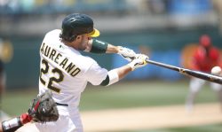 OAKLAND, CA - JULY 20: Ramón Laureano #22 of the Oakland Athletics bats during the game against the Los Angeles Angels at RingCentral Coliseum on July 20, 2021 in Oakland, California. The Athletics defeated the Angels 6-0. (Photo by Michael Zagaris/Oakland Athletics/Getty Images)