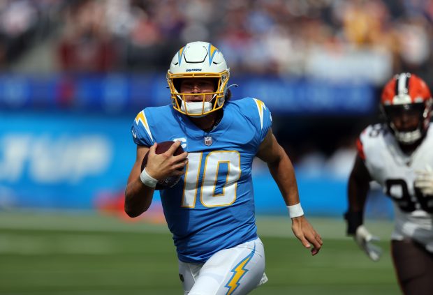 INGLEWOOD, CALIFORNIA - OCTOBER 10: Justin Herbert #10 of the Los Angeles Chargers at SoFi Stadium on October 10, 2021 in Inglewood, California. (Photo by Ronald Martinez/Getty Images)