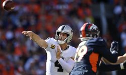 DENVER, COLORADO - OCTOBER 17: Derek Carr #4 of the Las Vegas Raiders throws during the second quarter against the Denver Broncos at Empower Field At Mile High on October 17, 2021 in Denver, Colorado. (Photo by Dustin Bradford/Getty Images)