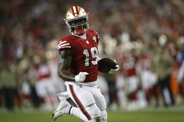 SANTA CLARA, CA - NOVEMBER 15: Deebo Samuel #19 of the San Francisco 49ers heads to the end zone on a 40-yard touchdown catch during the game against the Los Angeles Rams at Levi's Stadium on November 15, 2021 in Santa Clara, California. The 49ers defeated the Rams 31-10. (Photo by Michael Zagaris/San Francisco 49ers/Getty Images)