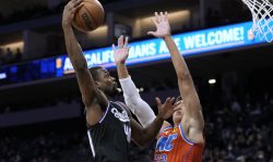 SACRAMENTO, CALIFORNIA - DECEMBER 28: Harrison Barnes #40 of the Sacramento Kings goes up to shoot over Isaiah Roby #22 of the Oklahoma City Thunder during the first quarter at Golden 1 Center on December 28, 2021 in Sacramento, California. NOTE TO USER: User expressly acknowledges and agrees that, by downloading and or using this photograph, User is consenting to the terms and conditions of the Getty Images License Agreement. (Photo by Thearon W. Henderson/Getty Images)