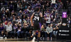 SACRAMENTO, CALIFORNIA - DECEMBER 19: Buddy Hield #24 of the Sacramento Kings celebrating making a 3-pointer against the San Antonio Spurs at Golden 1 Center on December 19, 2021 in Sacramento, California. NOTE TO USER: User expressly acknowledges and agrees that, by downloading and/or using this photograph, User is consenting to the terms and conditions of the Getty Images License Agreement. (Photo by Kavin Mistry/Getty Images)