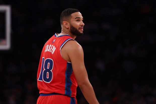 NEW YORK, NEW YORK - DECEMBER 21: Cory Joseph #18 of the Detroit Pistons in action against the New York Knicks at Madison Square Garden on December 21, 2021 in New York City. NOTE TO USER: User expressly acknowledges and agrees that, by downloading and or using this photograph, User is consenting to the terms and conditions of the Getty Images License Agreement. New York Knicks defeated the Detroit Pistons 105-91. (Photo by Mike Stobe/Getty Images)