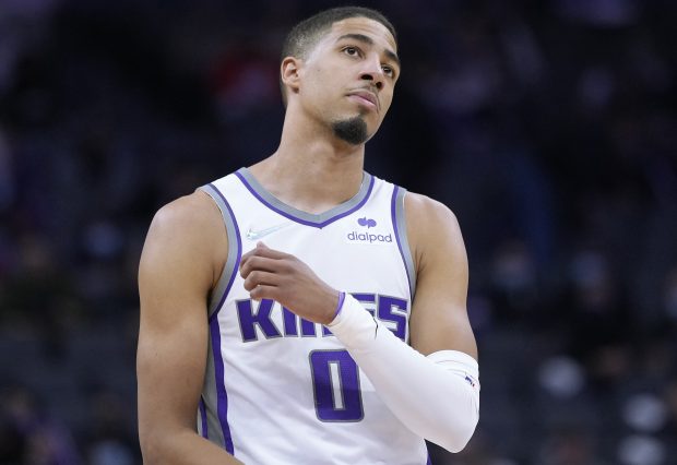 SACRAMENTO, CALIFORNIA - NOVEMBER 22: Tyrese Haliburton #0 of the Sacramento Kings looks on against the Philadelphia 76ers during the second half of an NBA basketball game at Golden 1 Center on November 22, 2021 in Sacramento, California. NOTE TO USER: User expressly acknowledges and agrees that, by downloading and or using this photograph, User is consenting to the terms and conditions of the Getty Images License Agreement. (Photo by Thearon W. Henderson/Getty Images)