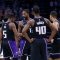 SACRAMENTO, CALIFORNIA - DECEMBER 08: Sacramento Kings players talk during a break in play in the fourth quarter against the Orlando Magic at Golden 1 Center on December 08, 2021 in Sacramento, California. NOTE TO USER: User expressly acknowledges and agrees that, by downloading and/or using this photograph, User is consenting to the terms and conditions of the Getty Images License Agreement. (Photo by Lachlan Cunningham/Getty Images)