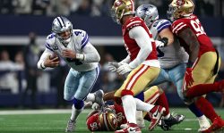 ARLINGTON, TEXAS - JANUARY 16: Dak Prescott #4 of the Dallas Cowboys in action against the San Francisco 49ers during the second half in the NFC Wild Card Playoff game at AT&T Stadium on January 16, 2022 in Arlington, Texas. (Photo by Tom Pennington/Getty Images)