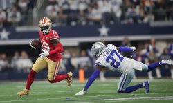 ARLINGTON, TX - JANUARY 16: Deebo Samuel #19 of the San Francisco 49ers runs after making a catch during the NFC Wild Card Playoff game against the Dallas Cowboys at AT&T Stadium on January 16, 2022 in Arlington, Texas. The 49ers defeated the Cowboys 23-17. (Photo by Michael Zagaris/San Francisco 49ers/Getty Images)