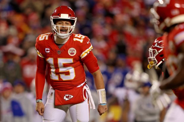 KANSAS CITY, MISSOURI - JANUARY 23: Patrick Mahomes #15 of the Kansas City Chiefs reacts during the game against the Buffalo Bills in the AFC Divisional Playoff game at Arrowhead Stadium on January 23, 2022 in Kansas City, Missouri. (Photo by Jamie Squire/Getty Images)
