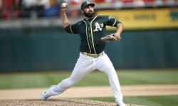 OAKLAND, CA - SEPTMEBER 25: Lou Trivino #62 of the Oakland Athletics pitches during the game against the Houston Astros at RingCentral Coliseum on September 25, 2021 in Oakland, California. The Athletics defeated the Astros 2-1. (Photo by Michael Zagaris/Oakland Athletics/Getty Images)