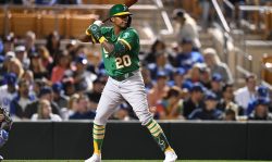 GLENDALE, AZ - MARCH 29, 2022: Cristian Pache #20 of the Oakland Athletics bats during the seventh inning of an MLB spring training game against the Los Angeles Dodgers at Camelback Ranch on March 29, 2022 in Glendale, Arizona. (Photo by Chris Bernacchi/Diamond Images via Getty Images)