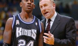 Sacramento Kings' head coach Rick Adelman (R) tells the Kings' Bobby Jackson (L) what to do as the Kings lose their lead to the Lakers during the fourth quarter in Los Angeles, 18 November 2001. The Lakers won 93-85. AFP PHOTO/Lucy NICHOLSON (Photo by LUCY NICHOLSON / AFP) (Photo by LUCY NICHOLSON/AFP via Getty Images)