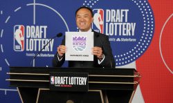 SECAUCUS, NJ - AUGUST 20: Deputy Commissioner of the NBA, Mark Tatum holds up the card of the Sacramento Kings after they get the 12th overall pick in the NBA Draft during the 2020 NBA Draft Lottery on August 20, 2020 at the NBA Entertainment Studios in Secaucus, New Jersey. NOTE TO USER: User expressly acknowledges and agrees that, by downloading and/or using this photograph, user is consenting to the terms and conditions of the Getty Images License Agreement. Mandatory Copyright Notice: Copyright 2020 NBAE (Photo by Steven Freeman/NBAE via Getty Images)